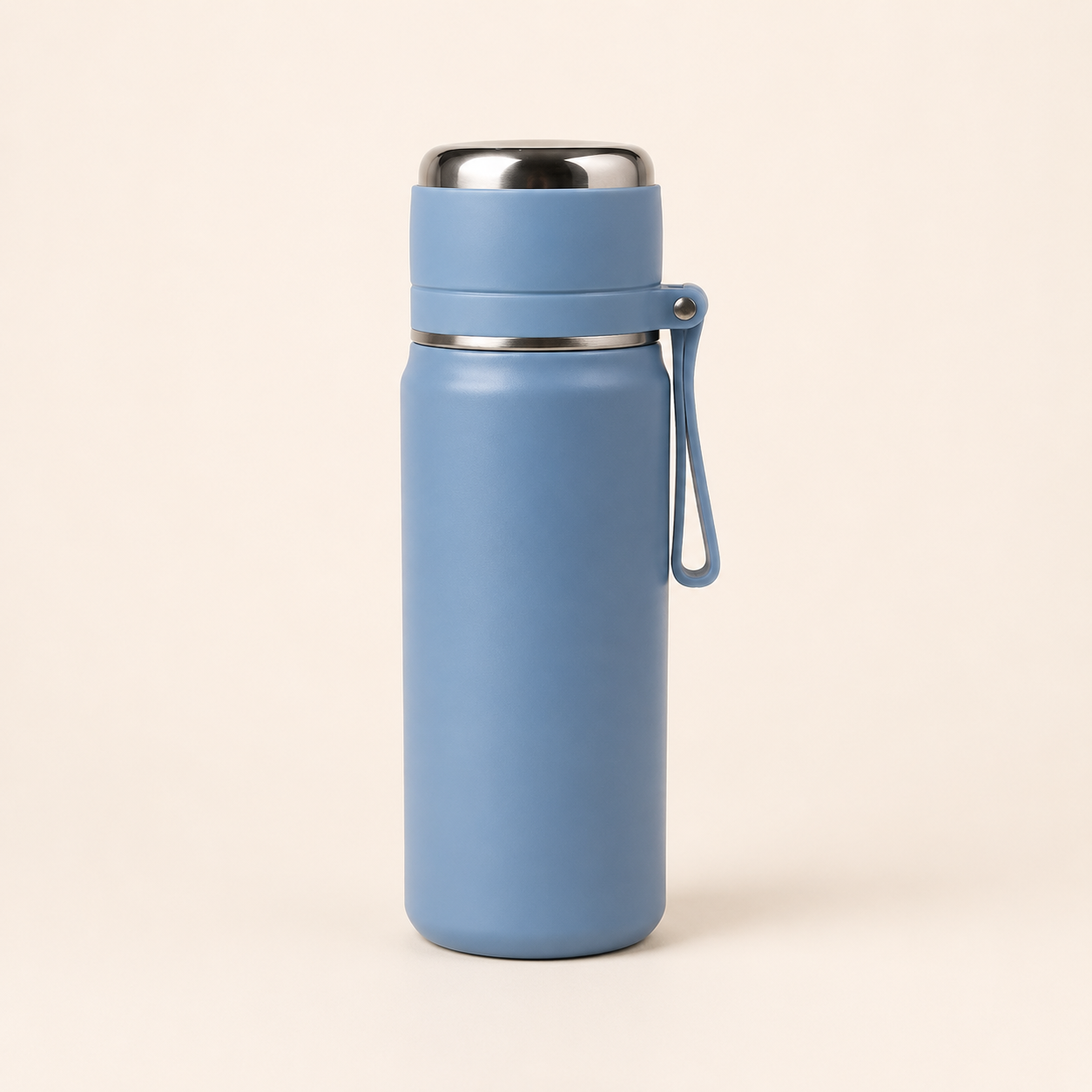 A matte blue insulated water bottle with a stainless steel lid and a matching blue carrying loop, shown on a plain beige background.