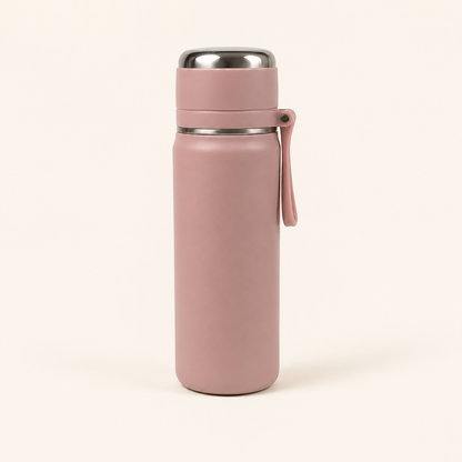 A matte dusty pink insulated water bottle with a stainless steel lid and a matching pink carrying loop, shown on a clean off-white background.