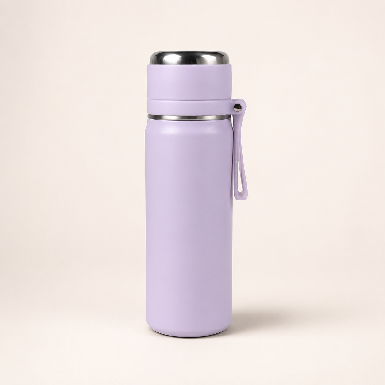 A light purple vacuum-insulated water bottle with a matching purple carrying loop and stainless steel accents, standing on a light beige background.