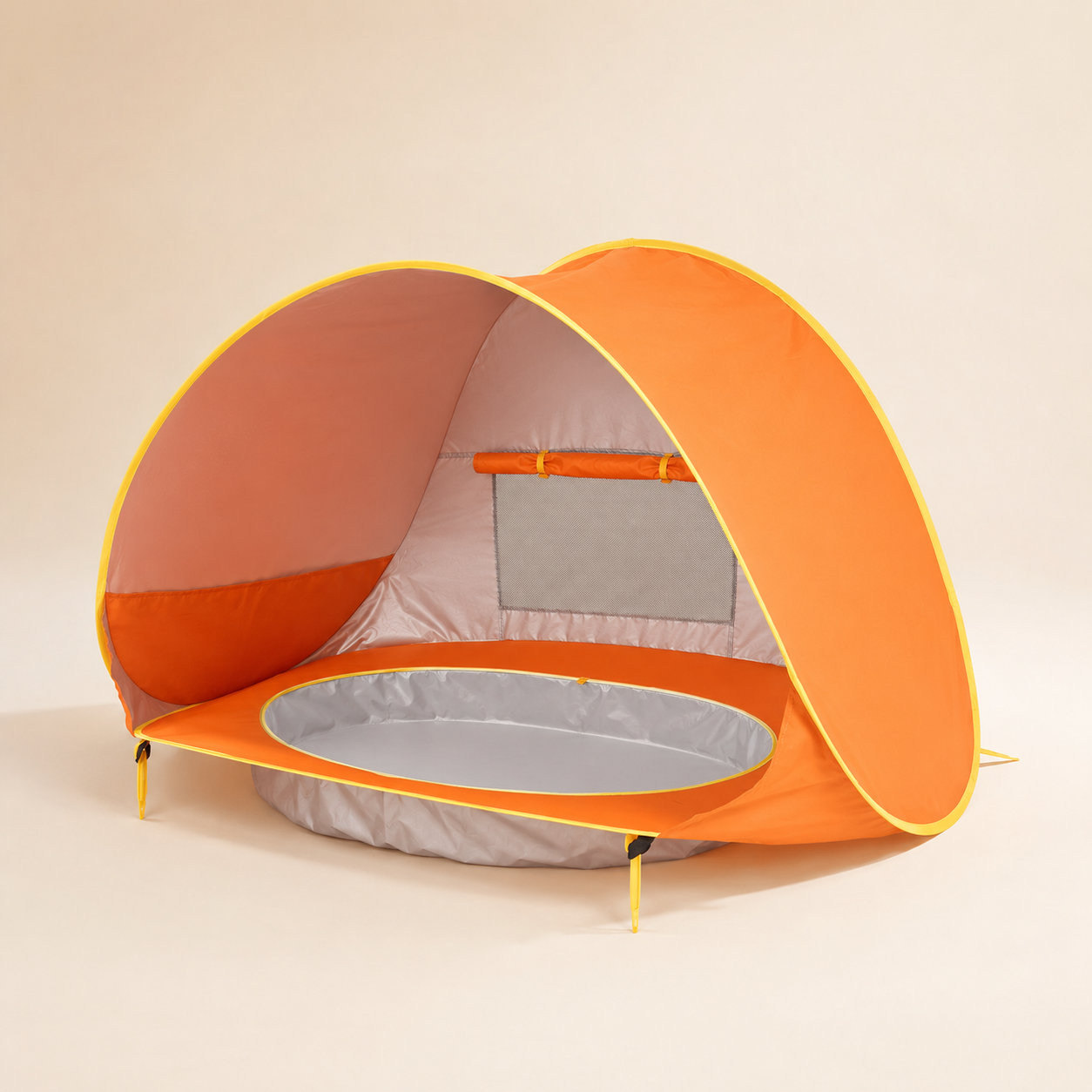 An orange and gray pop-up pet tent with a built-in shallow pool, shown on a plain beige studio background.