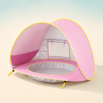 A pink pop-up baby tent with a silver interior and yellow trim, shown on a soft beige gradient background.