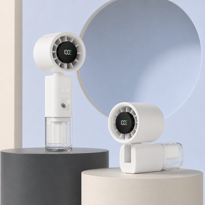 A white handheld personal fan with a circular digital display showing '00%' is shown in two configurations: one standing upright on a dark gray pedestal and one lying horizontally on a light beige pedestal. The background is a soft light blue with a large circular architectural element.