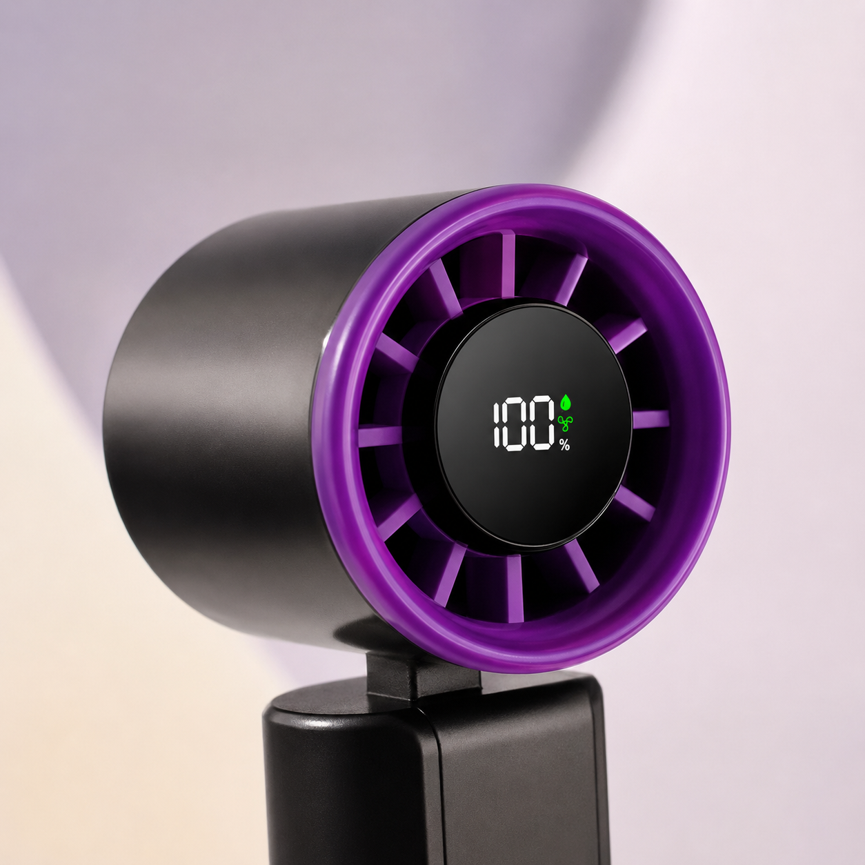 A modern black and purple electric fan with a digital display showing '100%' on the front, mounted on a black stand against a soft, light-colored background.